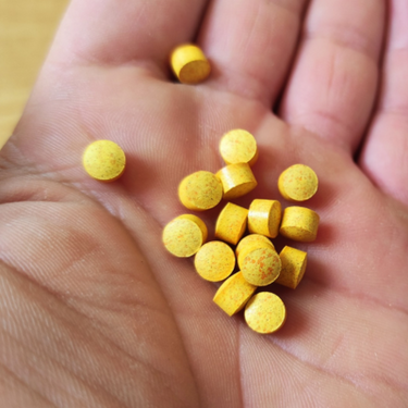 Customer positive review for Pact Nutrition Turmeric tablets with image showing the size tablets