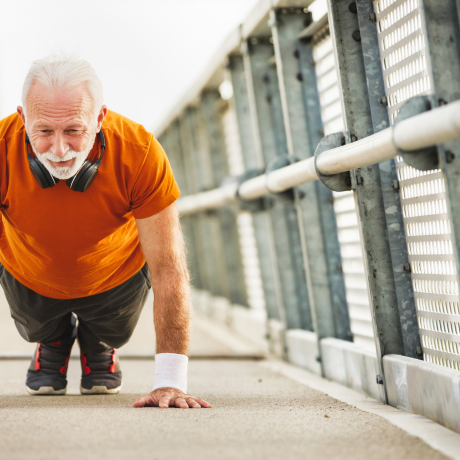 Elderly gentleman exercising for improved mobility and joint health