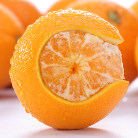 Orange with peel forming the letter C, symbolizing vitamin C benefits in immune support supplements